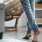young lady walking barefoot on carpet